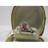 18CT WHITE GOLD DIAMOND & RUBY CLUSTER RING, principle cabochon cut ruby surrounded by brilliant cut