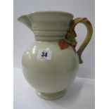 CLARICE CLIFF, Celadon ground floral and foliate handled jug, pattern No. H95, 9" height,