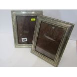 SILVER PHOTO FRAMES, a pair of rectangular form silver mounted easel photo frames, makers JB Ltd,