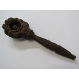 TREEN, a carved rose blossom surround nut cracker, 8.5" length