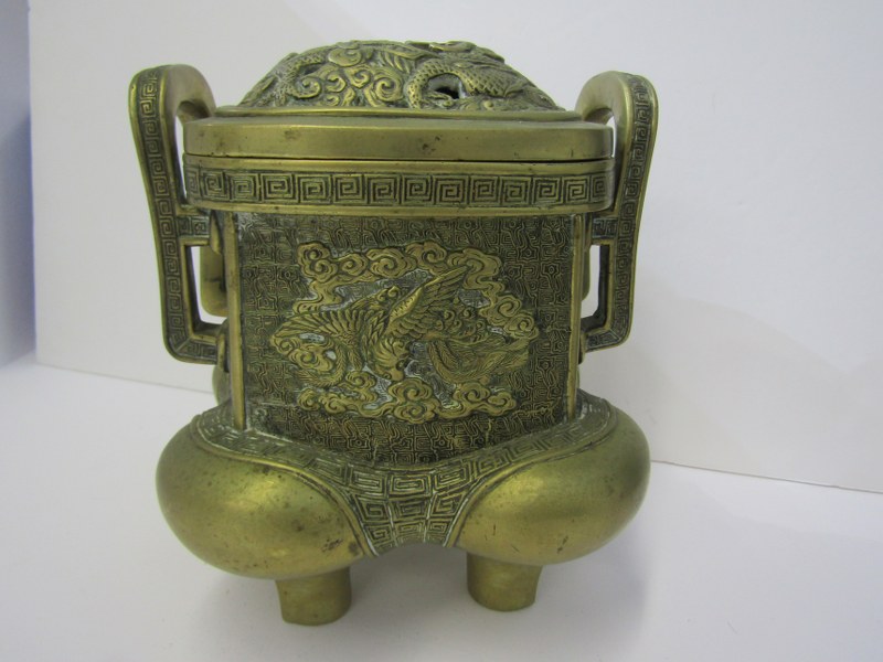 ORIENTAL METALWARE, Chinese twin handled brass temple incense burner decorated with dragon and other