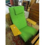 RETRO DESIGN, green upholstered low armchair with stylised arm panels