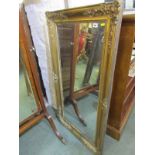 GILT MIRROR, rectangular wall mirror with applied Roccoco design decoration, 27" height 51" width