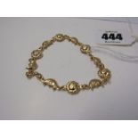 18ct YELLOW GOLD BRACELET OF SUN & MOON DESIGN, approx 7 grams