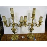 LIGHTING, gilt metal triple sconce amorini support candle sticks, 13" height