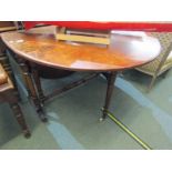 VICTORIAN SUTHERLAND TABLE, walnut drop leaf table with tapering column supports and scroll feet,