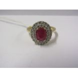 18ct YELLOW GOLD RUBY & DIAMOND CLUSTER, Principal oval cut ruby measuring in excess of 1ct