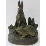 ANIMAL BRONZE, Alfred Dubucand signed oval base bronze with two hares, stamped on reverse "E V