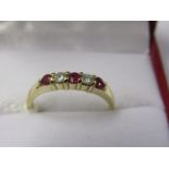 9ct YELLOW GOLD 5 STONE RUBY & DIAMOND RING, 3 Well matched rubies of good colour separated by a