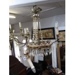 ANTIQUE LIGHTING, gilded metal triple branch and glass lustre light fitting