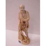 ANTIQUE IVORY CARVING, signed Japanese figure "Fisherman with net and catch"