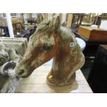 GARDEN STATUE, a stoneware horse head garden ornament, 16" height