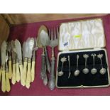 EASTERN SILVER, a boxed set of 6 coffee spoons with figure & palm finials together with a