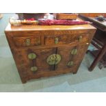CHINESE ELM CABINET, brass mounted cupboard base cabinet with triple frieze drawers, 36" width