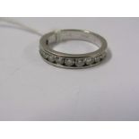 14ct WHITE GOLD CHANNEL SET DIAMOND HALF ETERNITY RING, approx 1ct of well matched brilliant cut