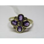 9ct YELLOW GOLD AMETHYST & DIAMOND CLUSTER RING, 4 principal oval cut amethysts, each seperated by a