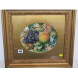 19th CENTURY ENGLISH SCHOOL, indistinctly signed oval watercolour "Still Life of Fruit on a mossy
