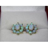 9ct YELLOW GOLD OPAL CLUSTER EARRINGS, with stud backs in floral design