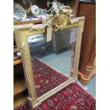 ANTIQUE GILT MIRROR, ornate crested and bevelled glass wall mirror, 42" height 32" width