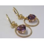 A PAIR OF 14ct YELLOW GOLD AMETHYST & DIAMOND EARRINGS, Unusual drop design, bow, hoop and heart,