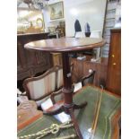 MAHOGANY PEDESTAL TABLE, with tilt top mechanism on fluted column support & tripod base, 20"