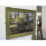 GILT WALL MIRROR, rectangular mirror with floral and foliate applied decoration, 28" x 34"