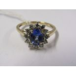 14ct YELLOW GOLD TANZANITE & DIAMOND CLUSTER RING, Principal oval cut tanzanite of approx 1.25ct