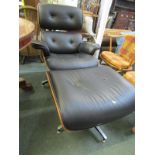 RETRO, Charles Eames - style black button back and chrome armchair with matching foot stool