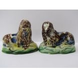 WHIELDON-TYPE LIONS, pair of slip glazed pottery resting lions, 3.5" width