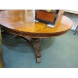 VICTORIAN FLAMBE MAHOGANY CIRCULAR DINING TABLE, 19th Century pillar support and trefoil base dining