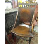 EDWARDIAN NURSING CHAIR with spindleback cresting and stamped ply panels