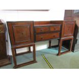 HEALS SIDEBOARD, early Art Deco mahogany veneered and ebony cross-banded twin pedestal sideboard