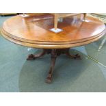 VICTORIAN BREAKFAST TABLE, burr walnut oval quartered top, on multi column base and carved scroll