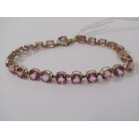 9ct YELLOW GOLD PINK TOPAZ TENNIS BRACELET with heart shaped pink topaz surrounded by diamonds on