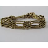 9CT YELLOW GOLD GATE STYLE BRACELET with heart padlock clasp, approx 17.07 grams
