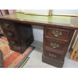 KNEEHOLE DESK, Edwardian twin pedestal desk with leather inset top and 6 graduated drawers, 44"