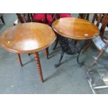 PUB TABLE, cast iron tripod base pub table, mahogany circular base with ornate mask decoration to