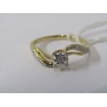 9CT YELLOW GOLD DIAMOND SOLITAIRE RING, principle brilliant cut diamond in a wave setting with