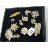 SILVER ITEMS including filagree floral brooches, leaf brooches, butterfly brooches and filagree