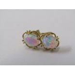 PAIR OF 9CT YELLOW GOLD OPAL EARRINGS, oval cabachon cut set in 9ct yellow gold floral style mounts