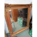 ANTIQUE GILT WALL MIRROR, rectangular with ornate applied scroll corners, 39" height 33" width