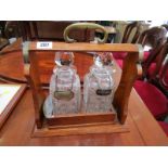 TANTALUS, oak framed 2 bottle tantalus with hob nail cut decanters, with silver sherry decanter