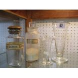 PHARMACEUTICAL, two glass storage jars & two etched conical measures