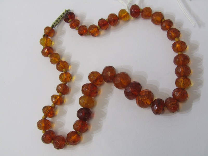 FACETED UNTESTED AMBER BEADS