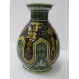 DOULTON LAMBETH, 6.75" baluster vase decorated by Eliza Simmance with arabesques on brown and