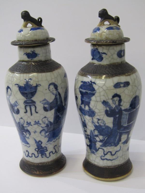 ORIENTAL CERAMICS, Pair of 19th Century crackle glaze lidded vases, decorated with schoolroom