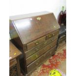 GEORGIAN DESIGN OAK BUREAU, 2 short and 3 long graduated drawers with shaped brass backplate handles