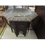 PERSIAN TABLE, a quality octagonal vine design carved occasional table with inset pierced and
