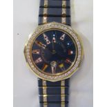 WRIST WATCH BY CORUM, Admirals Cup quartz movement, gold cased set with brilliant cut diamonds, full