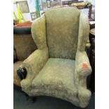 GEORGIAN DESIGN WING ARMCHAIR, in green foliate upholstery (requires restoration)